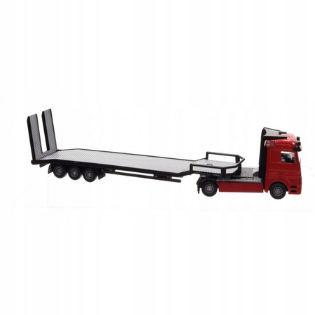 Autotransporter z dwoma pojazdami budowlanymi metalowymi